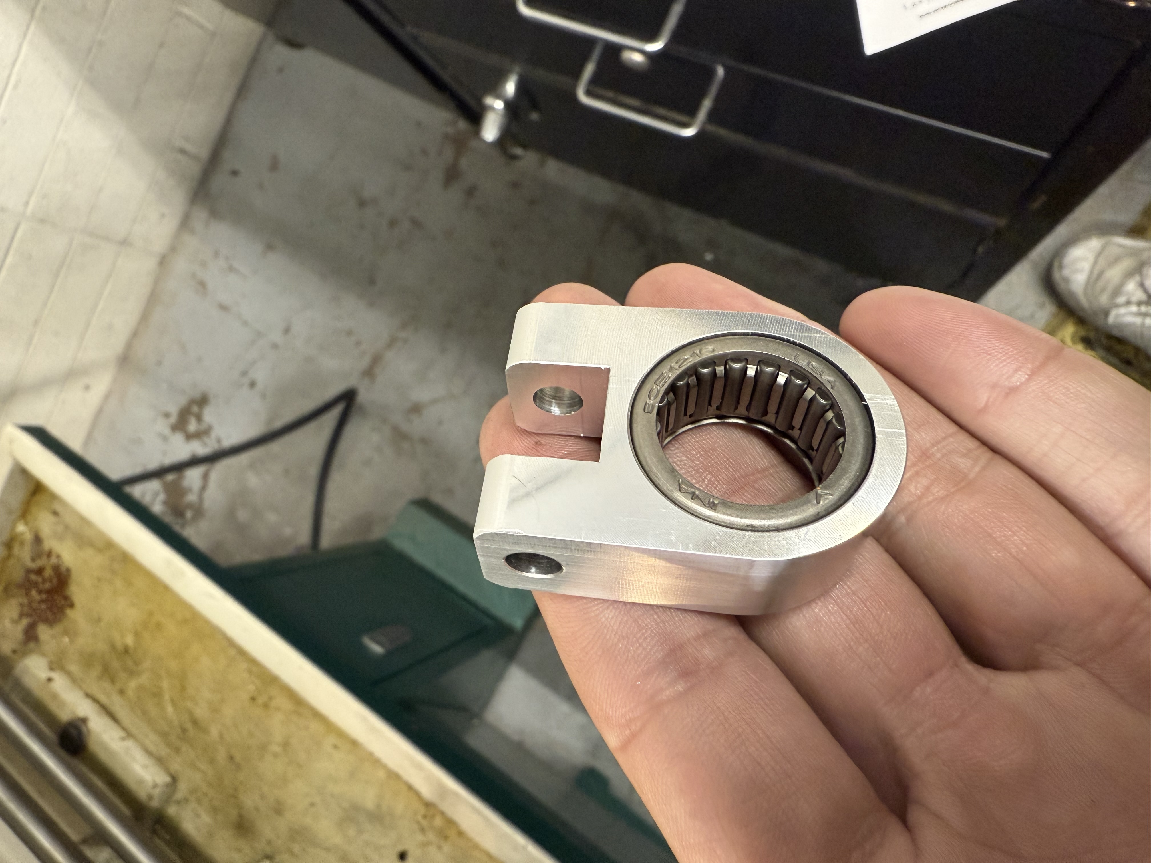 Custom machined shaft clevis with needle roller bearing